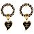 CHANEL - Orecchini a forma di cuore Chanel in metallo dorato D'oro