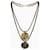 Collier Yves Saint Laurent, modèle Africa. Doré  - vue 1