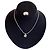 Conjunto de colgante y anillo Yves Saint Laurent plata