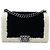 Chanel Schwarz Alt Mittel Bicolor Shearling Boy Flap