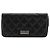 Cartera larga Matelassé Chanel en piel de cordero negro