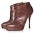 Bottines à plateforme en cuir marron Gucci.