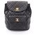 Timeless Chanel Matelassé Lammfell Rucksack Schwarz