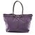 Bolso de mano de nylon jacquard Prada en marrón y púrpura