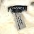 Bracciale in pelliccia con logo CC Coco vintage di Chanel Nero Bianco Giallo - vista 10