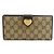 Cartera larga bi-fold de lona GG marrón y cuero Gucci Castaño