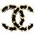 Spilla Chanel in pelle intrecciata