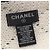 Cachecol com logo Chanel Coco Mark, feito de lã, seda e caxemira, disponível em preto marfim. - vista 2