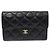 Chanel Serie di Portafoglio Classico con Patta in Caviar Nero e Logo CC Oro
