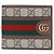 Gucci Billetera bi-fold Ophidia GG Castaño
