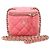 Vanity Chanel Mini bolsa cruzada de couro de cordeiro rosa com corrente dourada e caixa clássica para cosméticos