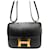 Hermès Constance Mini Epsom Oro Nero  - vista 1