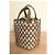 Alaïa Borsa Secchiello Alaia in Pelle Perforata Camel e Bianca Cammello - vista 6