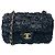 Bolso de cuero y cristal con aplique de flor de camelia negra Chanel Negro