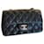 Timeless Peça muito rara. Bolsa Chanel Retangular com Aba em couro caviar preto