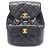 Timeless Chanel Matelassé Lammfell Rucksack Schwarz