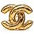 Spilla CHANEL Matelassé Coco Mark in design placcato oro D'oro