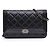 Cartera Boy de piel de cordero acolchada azul de Chanel con cadena Azul marino