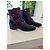 Botas de tornozelo de couro preto e marrom com fivela Prada - vista 2