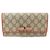 Gucci Cartera larga con cinta de acabado en PVC y logo GG en charol Castaño