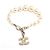 Chanel Bracciale CC in perle sintetiche avorio Arancione