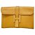 Bolso Clutch Jige PM de Hermès en Cuero Ardennes Dorado