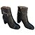 Botines Chanel de cuero negro con cadena