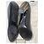Scarpe con tacco Gucci in pelle nera con borchie dorate - vista 3