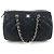 Bowling Chanel Borsa cilindrica in caviale, borsa a spalla, borsa a tracolla. Nero