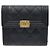 Chanel Cartera Boy de Caviar Negro y Oro