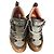 Sneakers Gucci Rhyton in pelle e tessuto Marrone Bianco Metallico