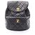 Timeless Chanel Matelassé Lammfell Rucksack Schwarz