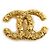 Spilla in metallo dorato Chanel D'oro