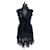 Abito in pizzo nero Givenchy con cerniere