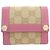 Billetera bi-fold GG 154119 de Gucci Castaño Rosa