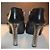 Botines Roberto Cavalli de cuero negro con tacón plateado - vista 3