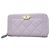 Billetera bi-fold Chanel Boy Púrpura