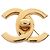 Broche Motivo Turnlock Coco Mark de Chanel Dorado