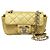 Borsa flap extra mini in pelle di agnello iridescente gialla di Chanel, usata