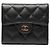 Billetera compacta con solapa de caviar acolchado negro CC Hermès