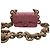 Mini borsa Chanel in agnello rosa con catena in legno