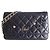 Wallet On Chain Portafoglio in pelle trapuntata nera Camelia con catena Chanel Nero