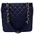 Bolso Shopping Chanel PST Negro y Dorado