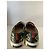 Sneaker Slip-On Gucci Graffiti GG in Pelle Nera Nero - vista 3