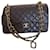 Timeless Borsa Chanel Classic Flap in pelle marrone