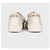 Baskets basses perforées blanches avec logo Chanel Taille 35,5 d'occasion - vue 4