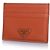 Prada, tarjetero de cuero saffiano en naranja