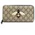 Portafoglio lungo da uomo Gucci in beige e marrone