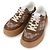 Gucci Sneakers in tela e pelle GG