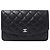 Billetera bi-fold matelassé de Chanel Negro